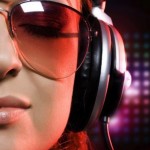 Girl in glasses wearing DJ headset